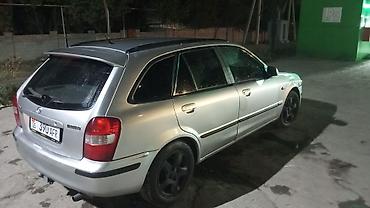 обмен демио: Mazda 323: 1999 г., Механика, Бензин, Универсал — 3