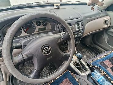 альфарт машина: Nissan Almera: 2002 г., 1.8 л, Механика, Газ, Хэтчбэк — 5