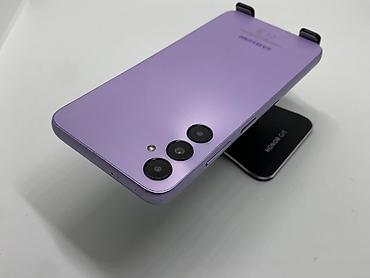 a 21: Samsung Galaxy A05s, Б/у, 128 ГБ, цвет - Розовый, 2 SIM — 4
