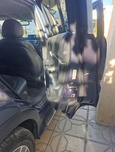 kia cerato manitoru: Kia Sportage (III nəsil) krossover - Kuzov: tünd-boz rəng, 5 qapı - — 9