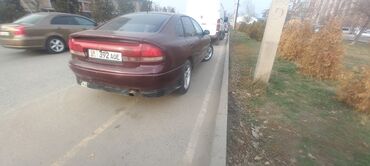 Mazda: Mazda Cronos: 1994 г., 2 л, Механика, Бензин, Хэтчбэк — 20