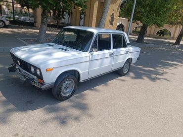 автомобиль базар: Ağ rəngli VAZ-2106 avtomobili. Bu model, geniş interyeri və