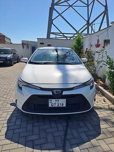 elit ehtiyat hisseleri: Toyota Corolla Touring Sports Hybrid – universal kuzovlu, ağ rəng — 9
