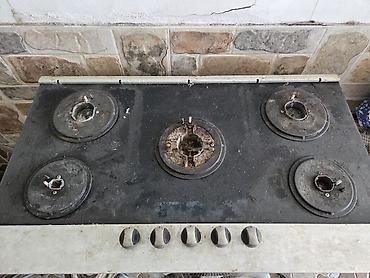 Qazlı stolüstü ocaq - 5 gözlü qaz paneli: mərkəzdə iri yanacaq göz