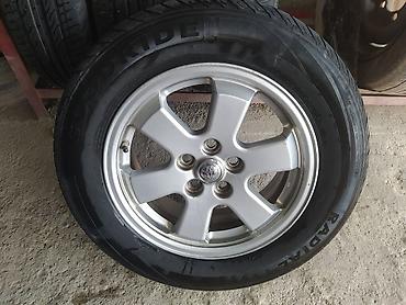 islenmis teker satisi: 4 ədəd yığılmış disk+şin komplekti əla vəziyyətdədiler pirus diskidi — 8