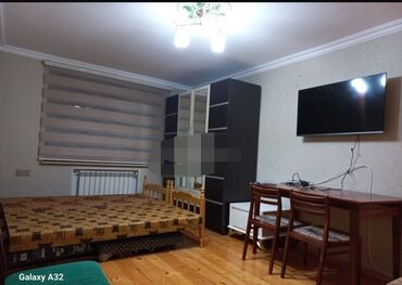 ищу квартиру с хозяйкой: Neftçilər metrosunun çıxışıda, Prestijli yerdə Rahat marketin