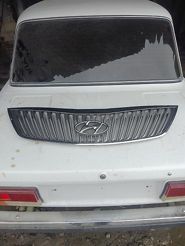 nissan march: Hyundai üslubunda dekorativ arxa baqaj barmaqlığı (radiator barmaqlığı — 3