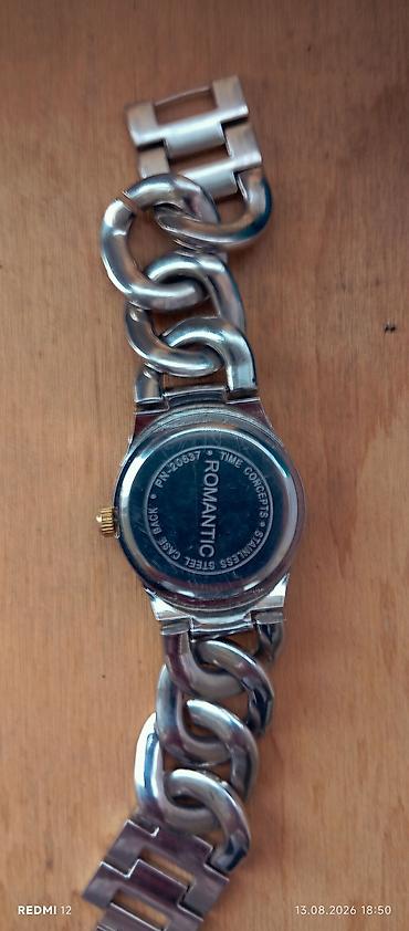 swatch saatlari: Qadın qol saatı – ROMANTIC brendi - Korpus: metal, dairəvi - Rəng — 2