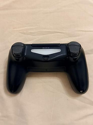 playstation 4 slim ikinci el: Playstation 4 slim 1 tb yaddasnan. Ev seraitinde istifade olunub.Hec — 6