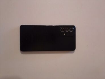 50 manatliq telefonlar: Samsung Galaxy A52, 128 ГБ, цвет - Черный, Отпечаток пальца, Две SIM карты, Face ID