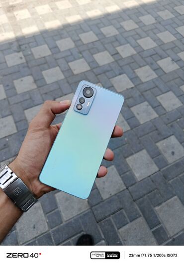 islenmis telfonlar: Xiaomi 12 Lite, 128 GB, rəng - Göy, 
 Düyməli, Barmaq izi, Face ID