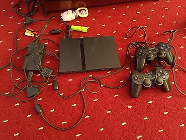 2 t: PlayStation 2 Slim комплект - Консоль Sony PlayStation 2 Slim (серия — 1
