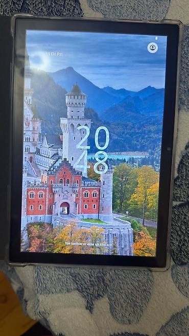 azercell modem wifi: Planşet – Android - Böyük ekranlı Android planşet. Ekranda saat/giriş — 2
