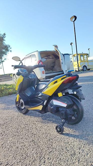 usag masini: Uşaq üçün elektrik skuter-motosiklet - Rəng: sarı/qara idman dizaynı — 1