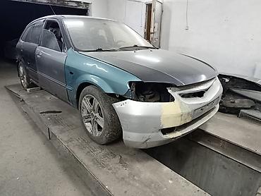 mazda 2000: Mazda 323: 2004 г., 2 л, Автомат, Бензин, Хэтчбэк — 2