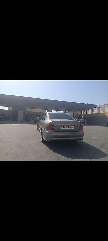 gurcustan avtomobil ehtiyat hisseleri: Opel Vectra B sedan - Korpus: 4 qapılı sedan, boz rəng - Mühərrik və — 6