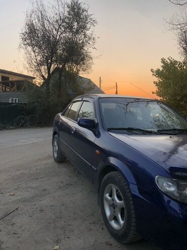 Mazda: Mazda 323: 2002 г., 1.6 л, Механика, Бензин, Седан