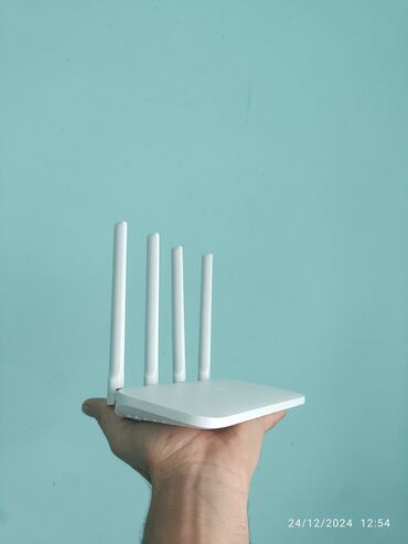 Modemlər və şəbəkə avadanlıqları: Xiaomi router wifi seti çatmayan yerlərə ötürücü. 4 antena çox