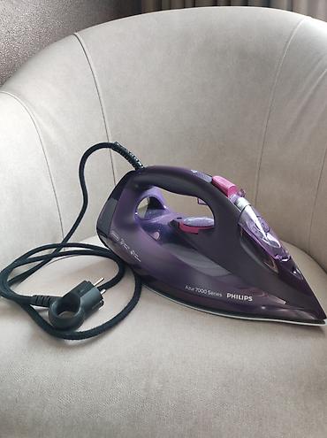 Утюги: Утюг Philips DST7061 Характеристики: Постоянная подача пара: 55 г/мин — 7