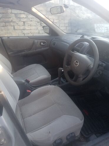 россия авто: Mazda Familia: 2000 г., 1.5 л, Автомат, Бензин, Седан