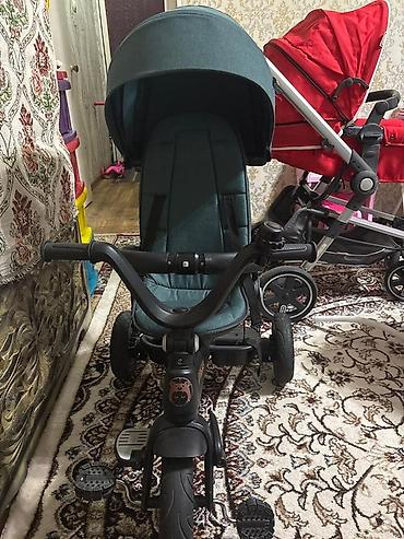 Детские велосипеды: Детский трёхколесный велосипед с сиденьем тёмно-зелёного цвета и — 3