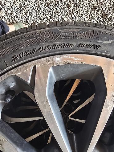 Шины: Комплект шин 215/45 R18 89V, радиальные, бескамерные. - Тип — 4