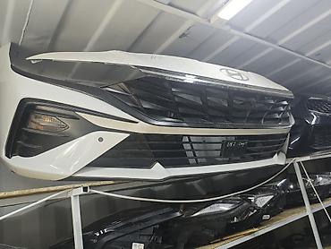 Передний бампер в сборе для Hyundai (оригинальный). Комплектация на