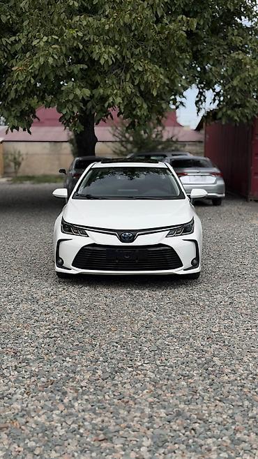 авто вариянт: Toyota Corolla: 2019 г., 1.8 л, Вариатор, Гибрид, Седан — 1