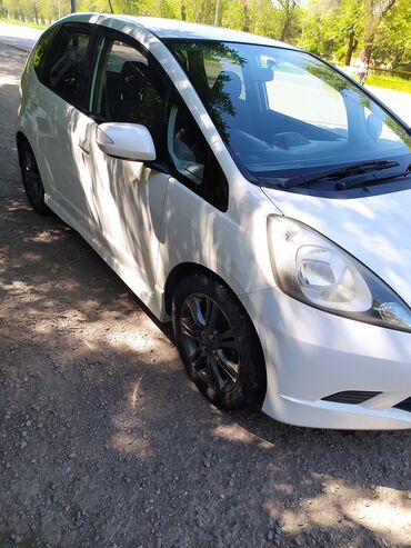 автомобил жаз: Honda Fit: 2009 г., 1.5 л, Автомат, Бензин, Хетчбек lalafo.kg да автомобил жаз: Honda Fit: 2009 г., 1.5 л, Автомат, Бензин, Хетчбек