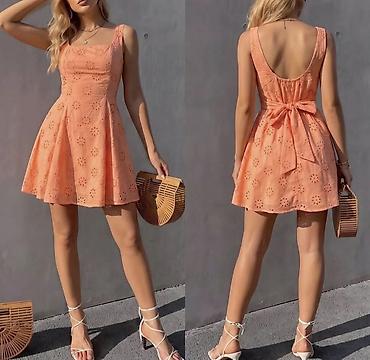 elegant draskovic: Haljina od pamučne broderije, mini dužine i A-kroja. Prednji deo ima — 3
