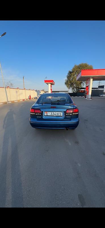 260: Mazda 626: 1997 г., 1.8 л, Механика, Бензин, Хэтчбэк — 6