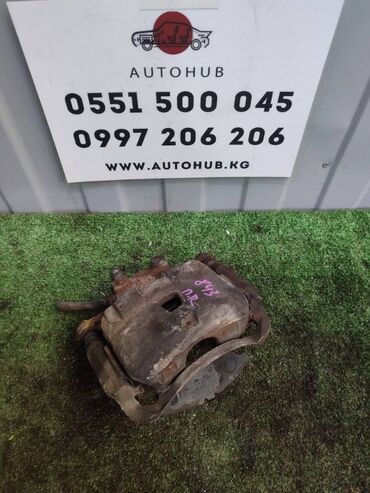 Другие детали салона: Суппорт Nissan March K11 1.0 2001 перед. прав. (б/у)