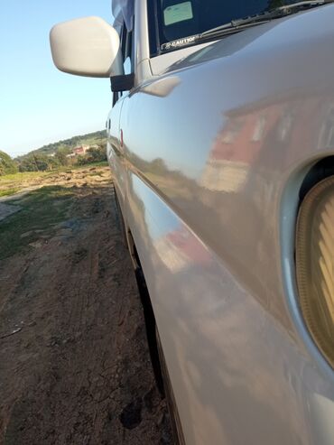 Mitsubishi: Mitsubishi Pajero iO 5 qapı SUV - Kuzov: ağ rəng, 5 qapı, arxa qapıda — 6