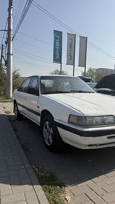 автомобильное зу: Mazda 626: 1990 г., 2 л, Механика, Бензин, Седан — 5
