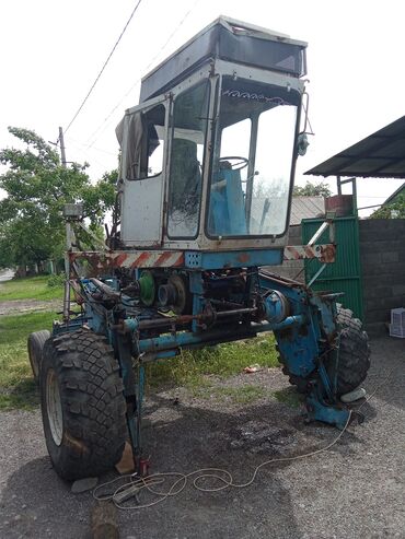 малинкий трактор: 700 мин сом