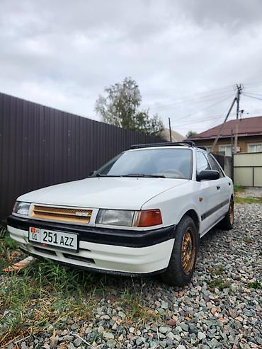 Mazda: Mazda 323: 1989 г., 1.6 л, Механика, Бензин, Седан — 1