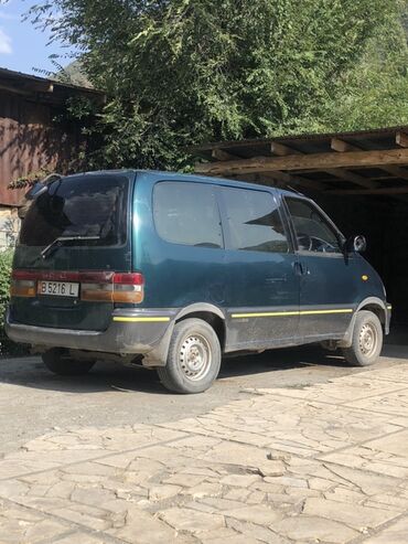 алфард продажа: Минивэн зеленого цвета, подходящий для семейных поездок и перевозки