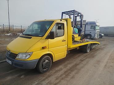 70 200: С частичной погрузкой, С лебедкой, С манипулятором — 1
