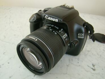 Фотоаппараты: Canon 1100d, Kit комплектация: Объектив 18-55 Блок зарядки, батарейка