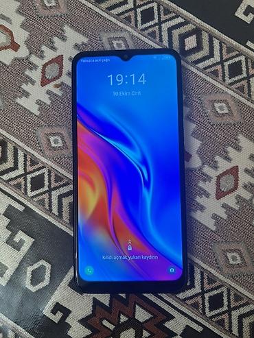 ev telefonsuz internet: TCL 305 (Model 6102D) smartfon - Ekran: 6.52" HD+ (720x1600), damcı — 1
