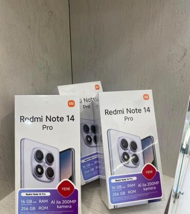 200 300 manat arasi telefonlar: Xiaomi Redmi Note 14 Pro, 256 GB, rəng - Mavi, 
 Zəmanət, Sensor, Simsiz şarj