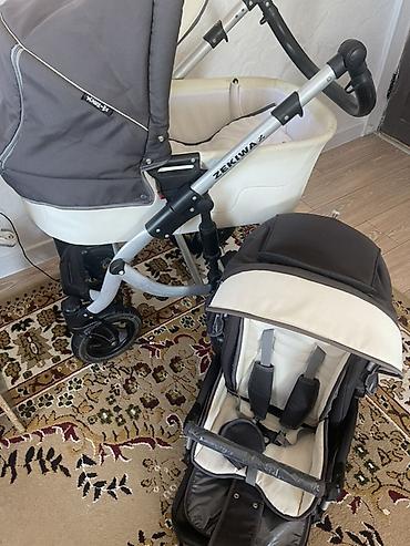 Коляски: Детская коляска Zekiwa (универсальная 2-в-1). Комплектация: - Люлька — 1