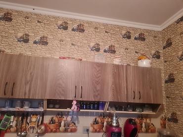 Mətbəx mebeli dəsti. - Üst modul: taxta teksturalı laminat fasadlar
