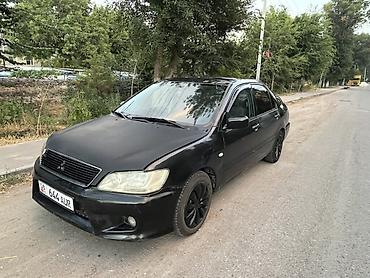 m5 e60 v10: Mitsubishi Lancer: 2002 г., 2 л, Автомат, Бензин, Седан — 1