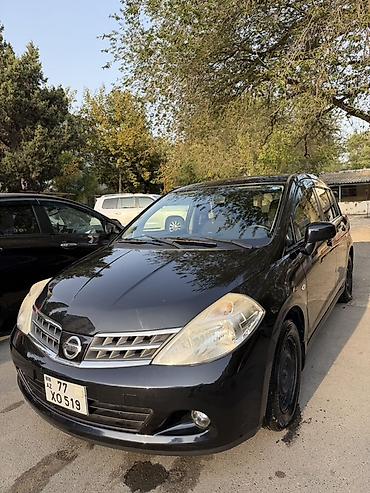 mini cooper 2009: Nissan Tiida hetçbek kuzovlu Qadin surub Cox ekonomik masindi ! — 1