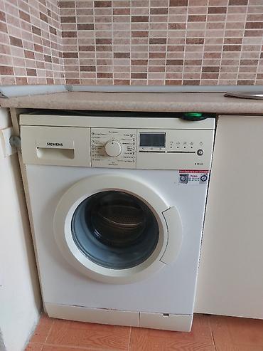 82 ekran televizor: Siemens önyükləməli paltaryuyan maşın - Ön şüşə qapılı, sərfəli — 1