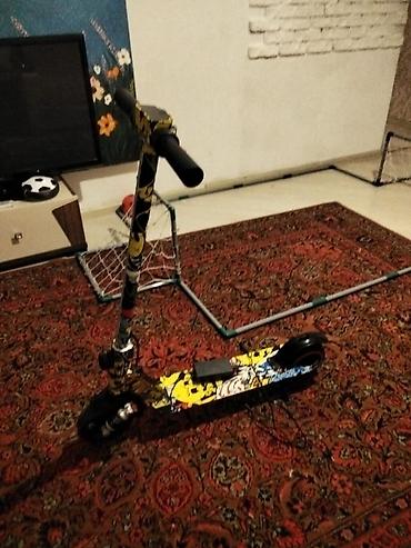самокат баку: Uşaq üçün elektrik skuter - Rəngli, komiks üslubunda vinil örtüklü — 4