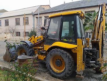 mtz 82 4x4: MST ekskavator-yükləyici (backhoe loader) - Marka/model: MST M5 — 3