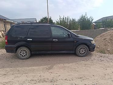 оптика гольф 3: Mitsubishi Chariot: 1999 г., 2.5 л, Автомат, Бензин, Универсал — 1
