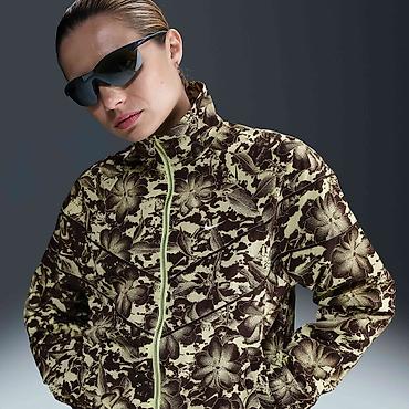 Bomberi: NIKE Sportswear Windrunner Women's Loose UV Protection Woven Full-Zip — 1